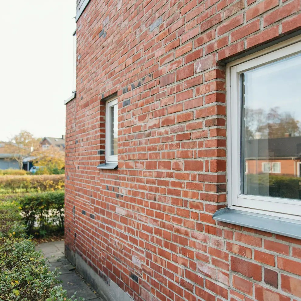 renovering av fuktskadad tegelfasad trafasad spanga stockholm